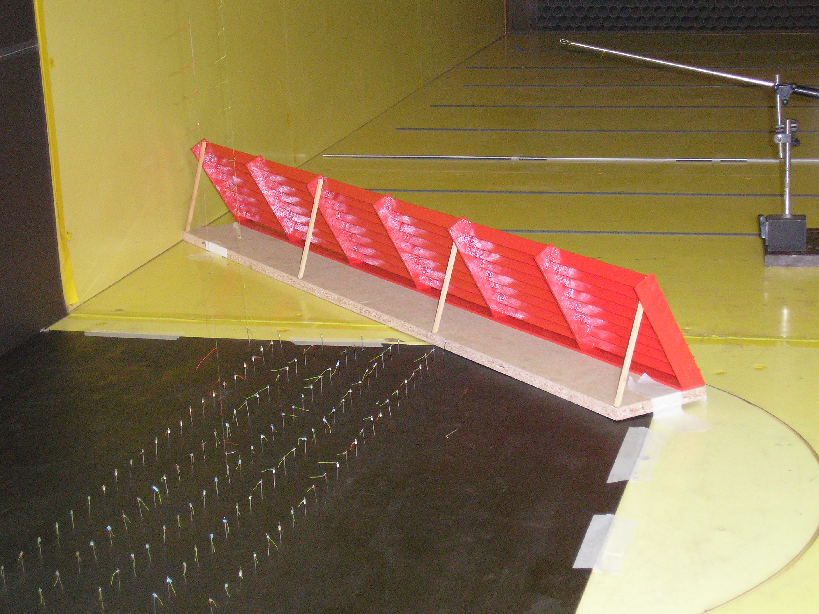 nsayo en túnel de viento de modelo de barrera antichorro (Cabecera de pista de aeropuerto de Montevideo)